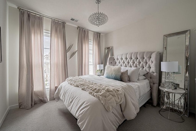 carpeted bedroom with visible vents