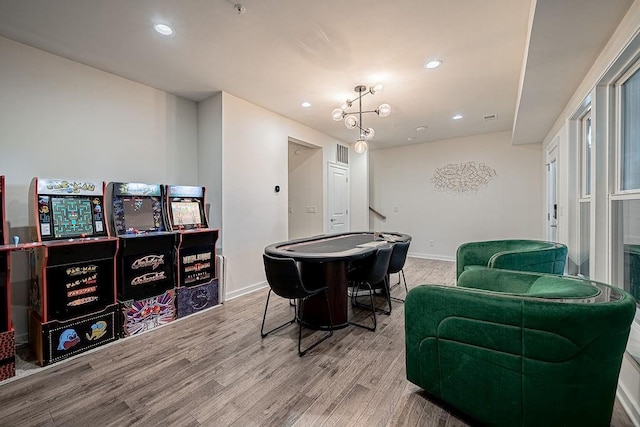 playroom featuring visible vents, recessed lighting, wood finished floors, and baseboards