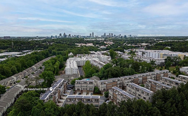 birds eye view of property featuring a city view