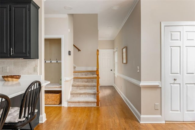 3157 Sawyer Ct NE, Marietta, GA 30066 - staircase with ornamental molding, wood finished floors, and baseboards