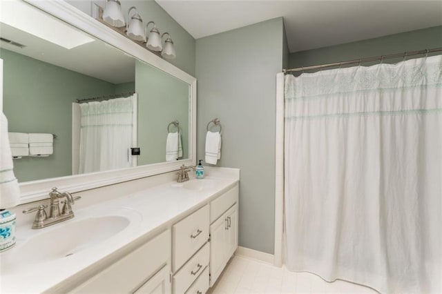 3157 Sawyer Ct NE, Marietta, GA 30066 - bathroom with a shower with curtain, double vanity, a sink, and visible vents
