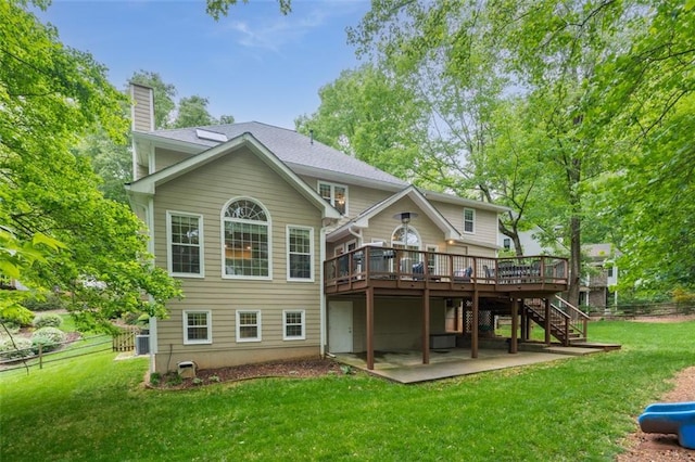 3157 Sawyer Ct NE, Marietta, GA 30066 - back of house with stairs, a deck, a patio area, a chimney, and fence