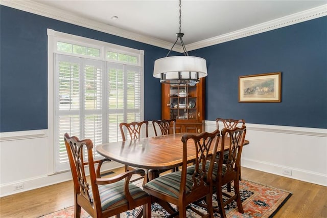 3157 Sawyer Ct NE, Marietta, GA 30066 - dining area featuring wood finished floors, ornamental molding, and wainscoting