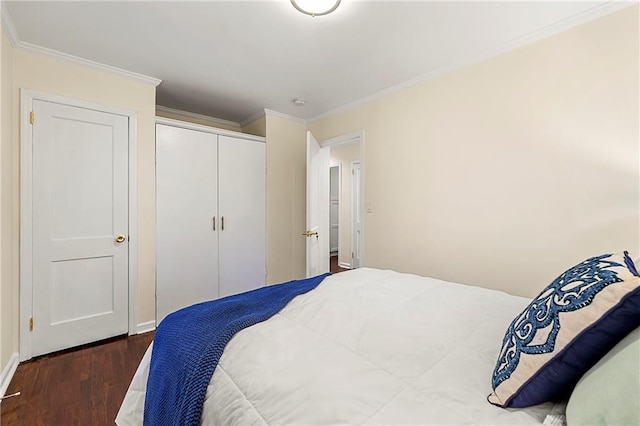 2903 Akron St, East Point, GA 30344 - bedroom featuring wood finished floors, a closet, and ornamental molding