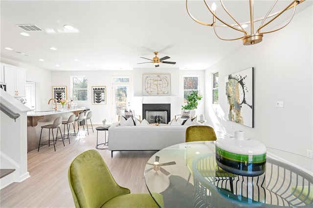 bonus room with ceiling fan, light colored carpet, and lofted ceiling