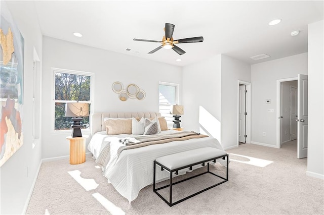 carpeted bedroom featuring ceiling fan