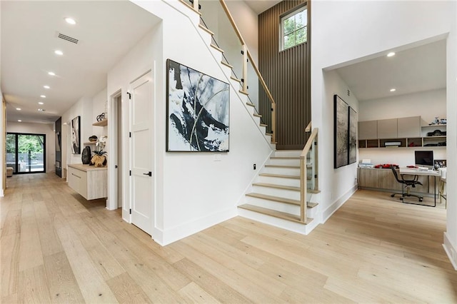 foyer with light wood-type flooring