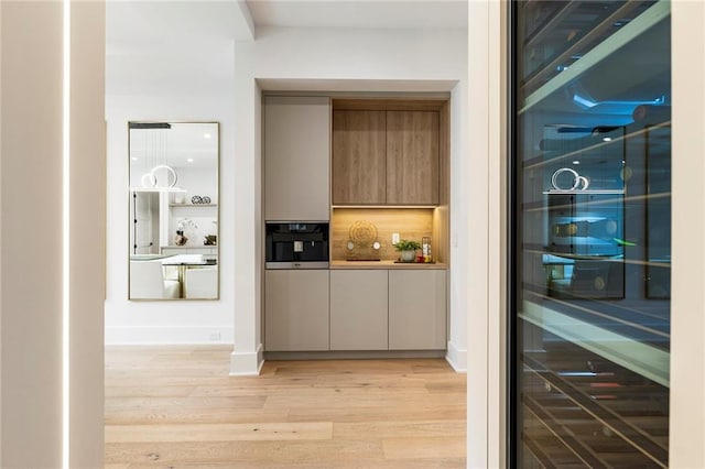 pantry featuring wine cooler