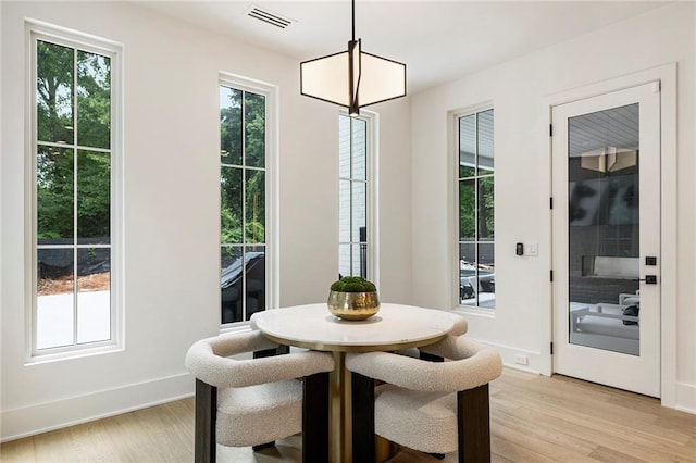 doorway with light hardwood / wood-style floors