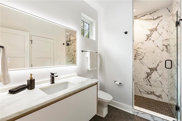 bathroom with vanity, toilet, walk in shower, and tile patterned flooring