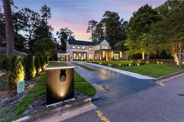 view of front of home featuring a yard