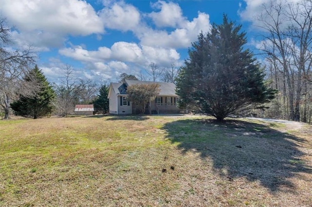 exterior space with crawl space and a front yard