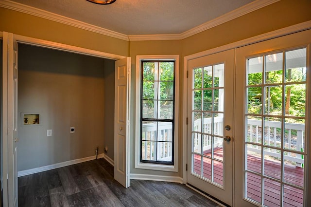 entryway with a healthy amount of sunlight, dark hardwood / wood-style floors, and french doors