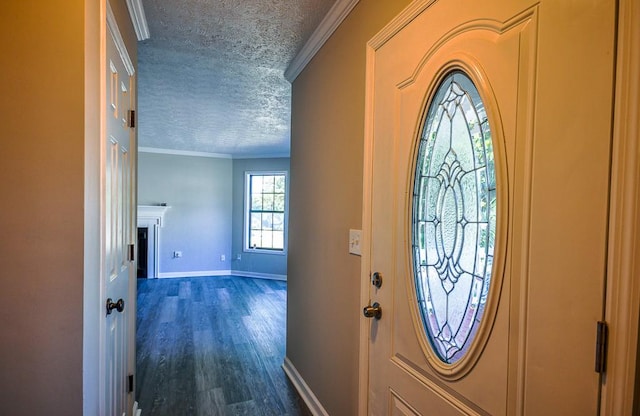 foyer entrance featuring a textured ceiling, crown molding, and dark hardwood / wood-style flooring