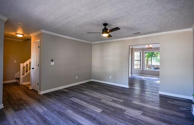 spare room featuring ceiling fan with notable chandelier, a textured ceiling, ornamental molding, and dark hardwood / wood-style flooring