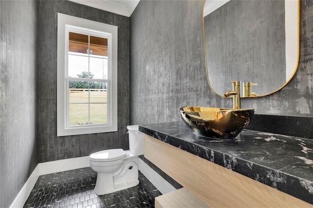 3893 Indian Shoals Rd, Dacula, GA 30019 - half bathroom with plenty of natural light, vanity, and tile patterned flooring