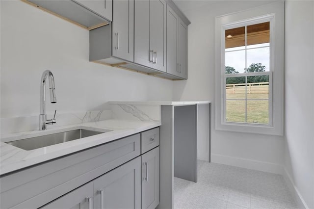 3893 Indian Shoals Rd, Dacula, GA 30019 - laundry room featuring plenty of natural light and light floors