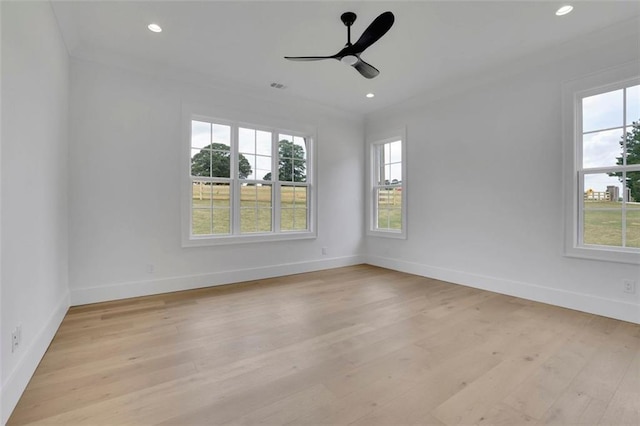 3893 Indian Shoals Rd, Dacula, GA 30019 - spare room with light wood finished floors, ceiling fan, recessed lighting, and crown molding