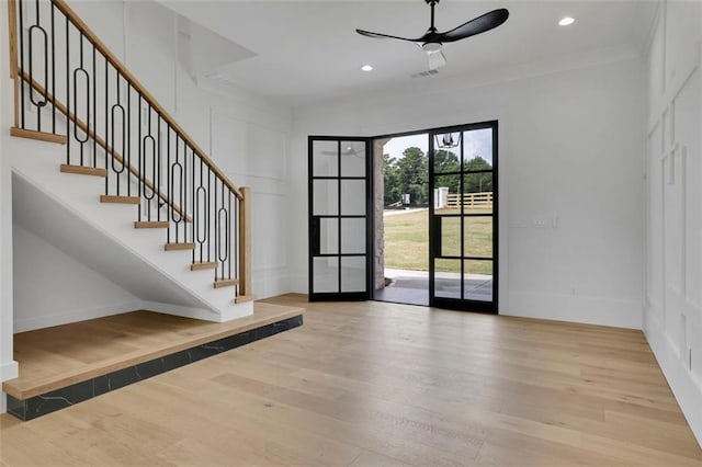 3893 Indian Shoals Rd, Dacula, GA 30019 - entryway featuring wood finished floors, a ceiling fan, stairway, and recessed lighting