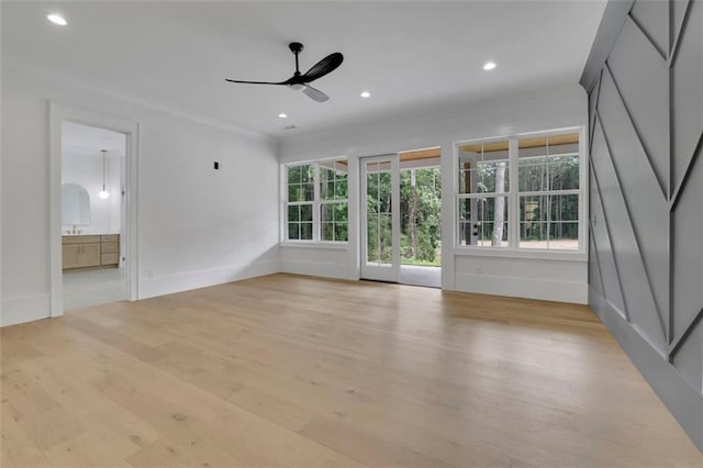 3893 Indian Shoals Rd, Dacula, GA 30019 - unfurnished living room with ceiling fan, light wood-style flooring, and recessed lighting