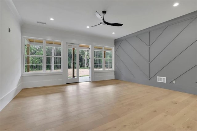 3893 Indian Shoals Rd, Dacula, GA 30019 - unfurnished living room featuring ceiling fan, wood finished floors, recessed lighting, and crown molding