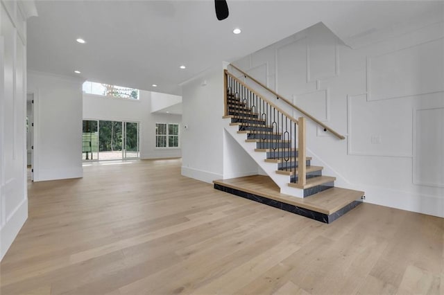 3893 Indian Shoals Rd, Dacula, GA 30019 - stairway featuring wood finished floors, recessed lighting, and ceiling fan