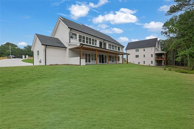 3893 Indian Shoals Rd, Dacula, GA 30019 - rear view of house with a yard