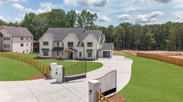 3893 Indian Shoals Rd, Dacula, GA 30019 - view of front of house featuring a fenced front yard, a gate, stucco siding, and roof with shingles