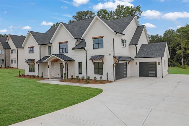 3893 Indian Shoals Rd, Dacula, GA 30019 - view of front facade featuring driveway, a standing seam roof, a front lawn, a shingled roof, and an attached garage