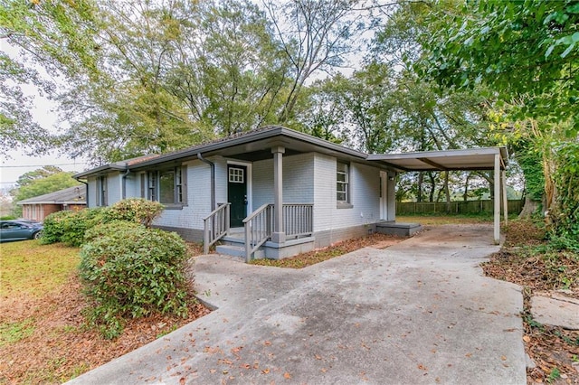 view of front of property with a carport