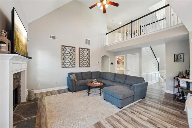 45 Peregrine Ln S, Dawsonville, GA 30534 - living area with high vaulted ceiling, a ceiling fan, wood finished floors, and visible vents