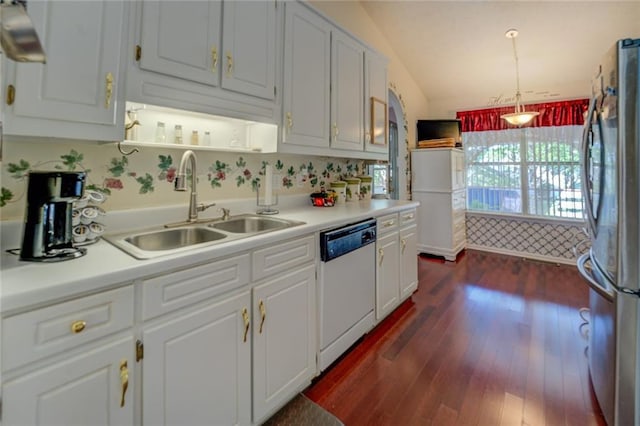 kitchen with white dishwasher, a sink, freestanding refrigerator, light countertops, and white cabinets