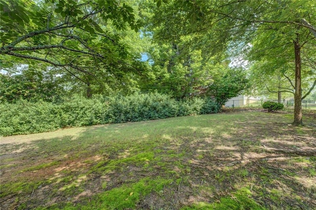 view of yard with fence