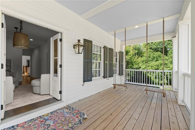 deck featuring covered porch