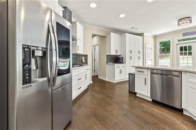 2055 Beacon Hill Way, Alpharetta, GA 30005 - kitchen featuring appliances with stainless steel finishes, ornamental molding, decorative backsplash, recessed lighting, and light countertops
