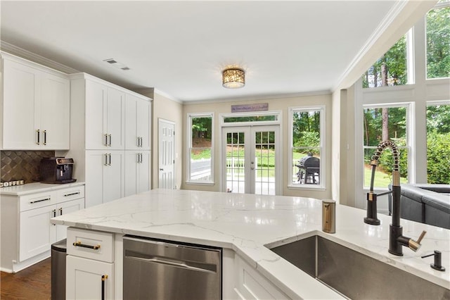 2055 Beacon Hill Way, Alpharetta, GA 30005 - kitchen featuring stainless steel dishwasher, ornamental molding, light stone countertops, and tasteful backsplash