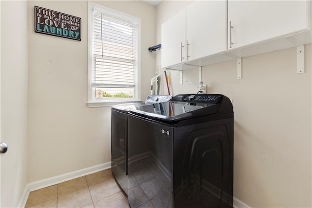 2055 Beacon Hill Way, Alpharetta, GA 30005 - laundry area featuring separate washer and dryer, cabinet space, and light tile patterned floors