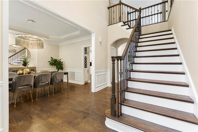 2055 Beacon Hill Way, Alpharetta, GA 30005 - entrance foyer with stairs, wood finished floors, crown molding, a chandelier, and wainscoting