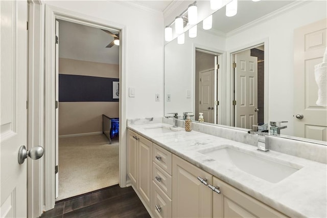 2055 Beacon Hill Way, Alpharetta, GA 30005 - bathroom with double vanity, ornamental molding, and wood finished floors