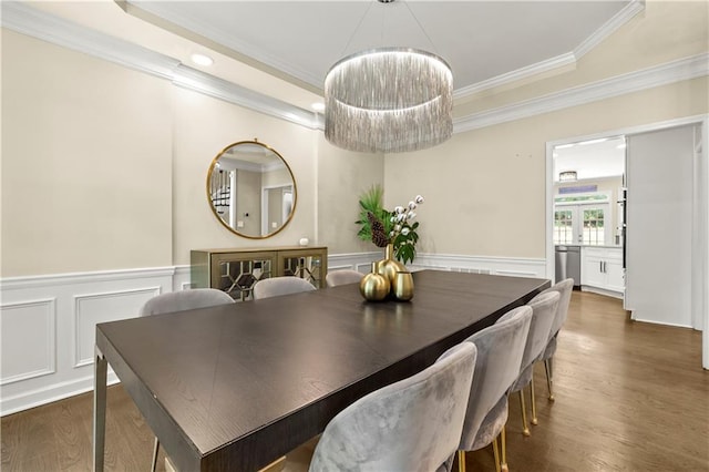 2055 Beacon Hill Way, Alpharetta, GA 30005 - dining space featuring crown molding, dark wood-style flooring, a tray ceiling, wainscoting, and a decorative wall