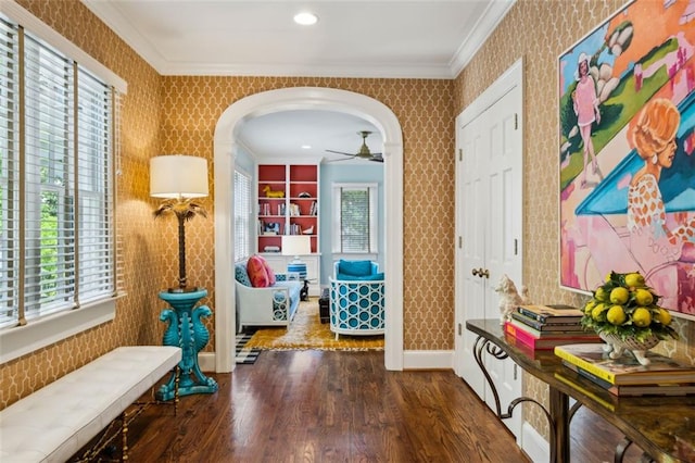 3086 E Pine Valley Rd NW, Atlanta, GA 30305 - living room featuring wood finished floors, crown molding, baseboards, ceiling fan, and built in shelves