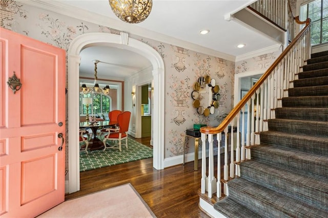 3086 E Pine Valley Rd NW, Atlanta, GA 30305 - entryway featuring an inviting chandelier, wallpapered walls, and ornamental molding