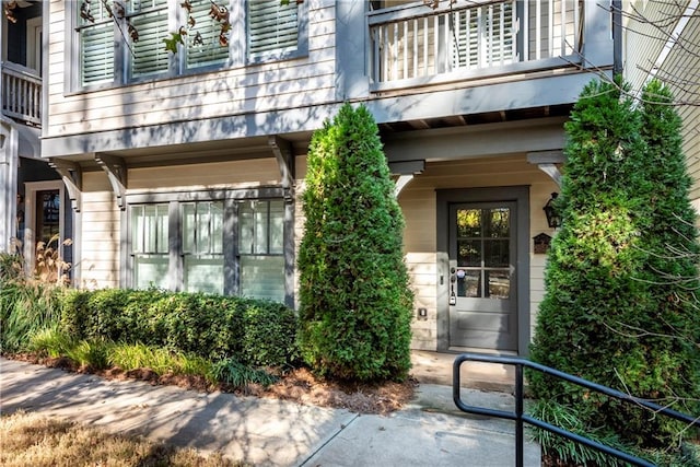 doorway to property featuring a balcony