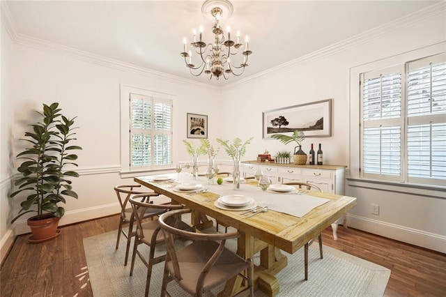 dining space featuring baseboards, a notable chandelier, ornamental molding, and dark wood-style flooring