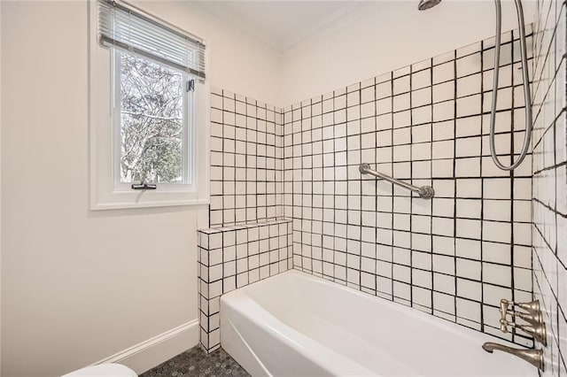 bathroom with baseboards, ornamental molding, and  shower combination