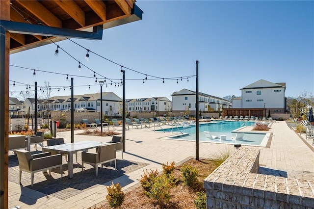 view of pool featuring a patio area