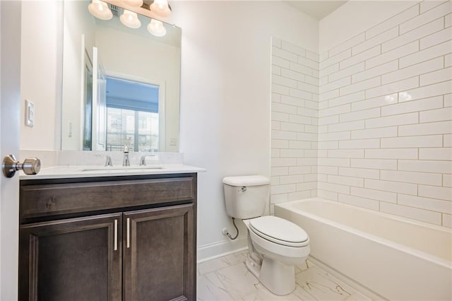 full bathroom with vanity, tiled shower / bath, and toilet