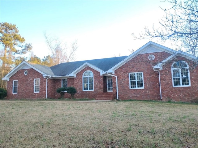 view of front of property with a front lawn