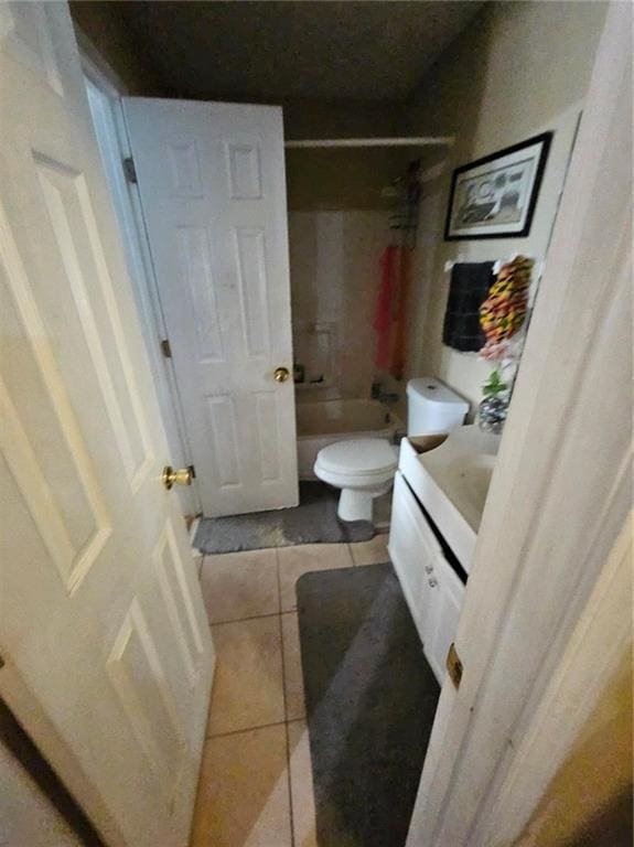 7073 Stonecreek Dr, Douglasville, GA 30134 - bathroom with vanity, tile patterned flooring, toilet, and shower / tub combination