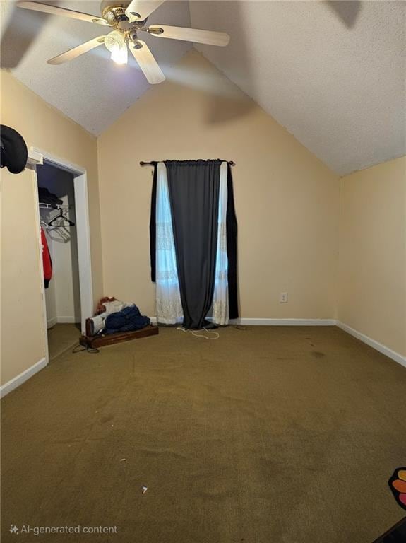 7073 Stonecreek Dr, Douglasville, GA 30134 - unfurnished bedroom with lofted ceiling, carpet flooring, and baseboards